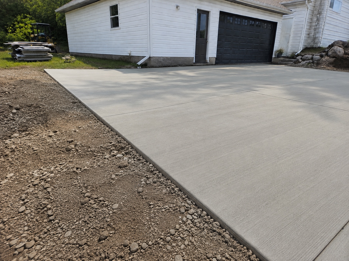Completed Catalyst Contractors concrete driveway and slab project